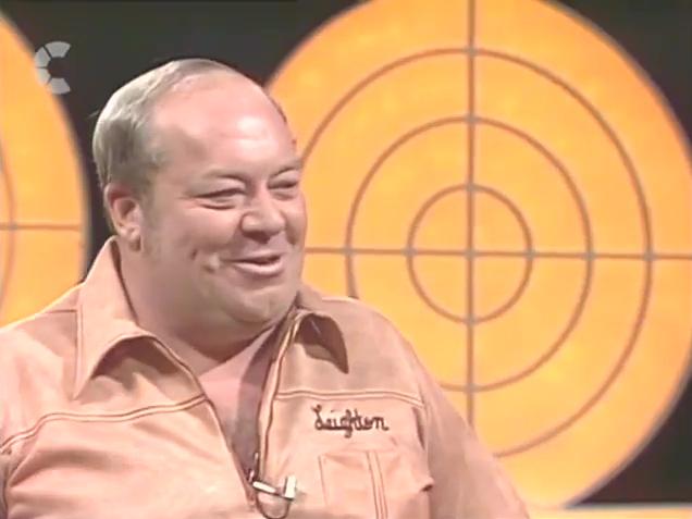 Leighton Rees smiling at Jim Bowen who is off camera