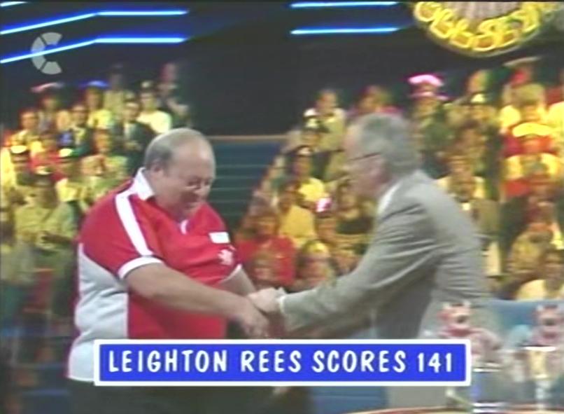 Leighton Rees shaking hands with Jim Bowen in series 9 of Bullseye