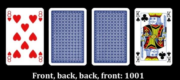 Four playing cards in a row. The outer two are face up; the inner two are face down