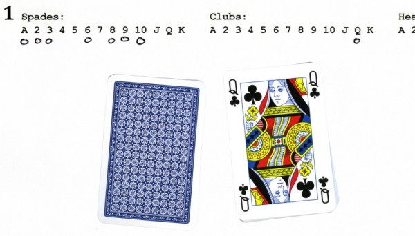 part of a piece of paper with the list of cards written on it. Some items in the list have zeroes hand-written underneath. Some cards are stacked underneath the list, face down. A face-up queen of clubs is to the right of this